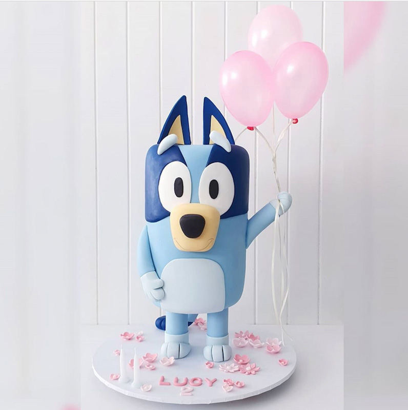 Balloon-holding Bluey cake