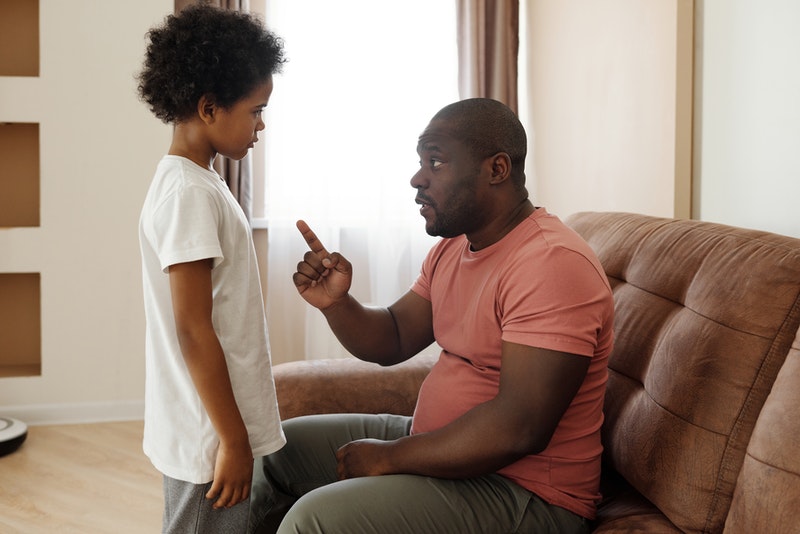 Parent disciplining child