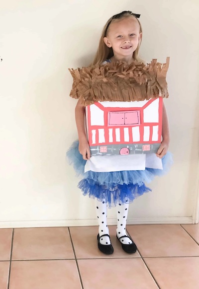 Alice in a house book week costume