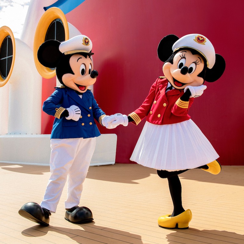 Mickey and Minnie Mouse dressed up as sailors